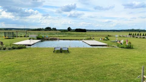 Blick über unseren Natur-Schwimmteich in die Ferne.